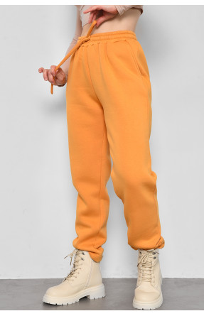 Спортивные штаны женские на флисе горчичного цвета 174712C