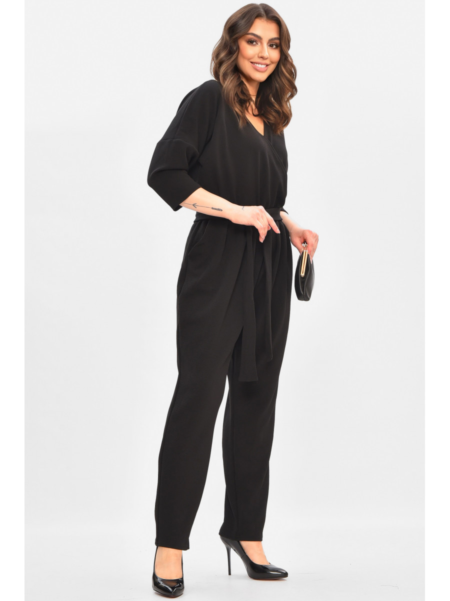 Комбінезон жіночий однотонний чорного кольору 8451 208176C