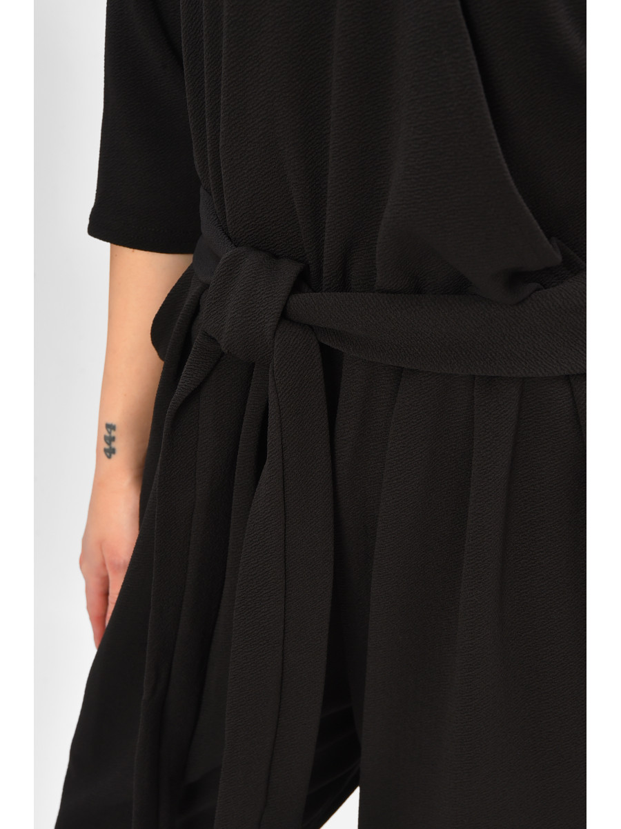 Комбінезон жіночий однотонний чорного кольору 8451 208176C