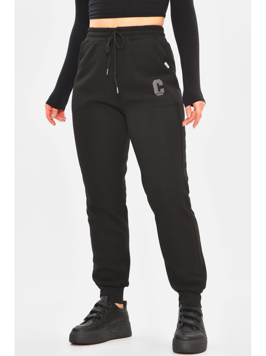 Спортивные штаны женские на флисе черного цвета 9995 208324C