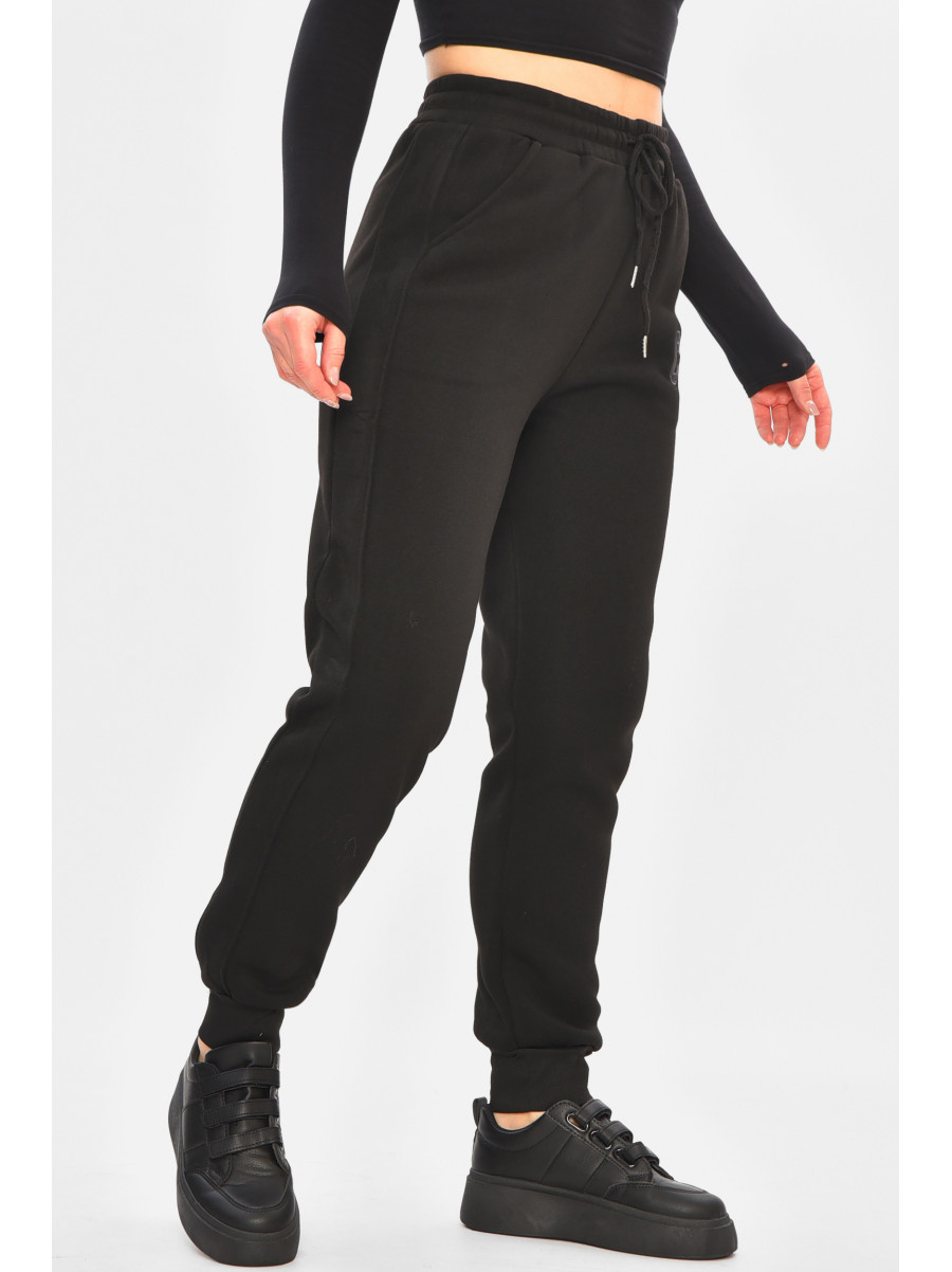 Спортивные штаны женские на флисе черного цвета 9995 208324C