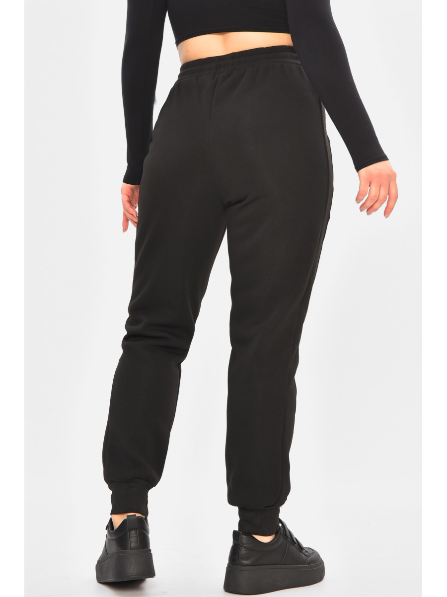 Спортивные штаны женские на флисе черного цвета 9995 208324C