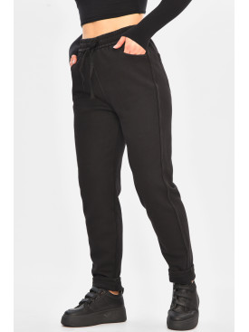 Штани жіночі однотонні на флісі чорного кольору А4111-3 208395C Штани жіночі однотонні на флісі чорного кольору А4111-3 208395C