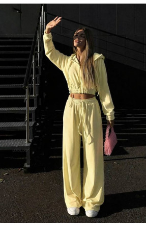 Спортивный костюм женский желтого цвета 1053 210992C