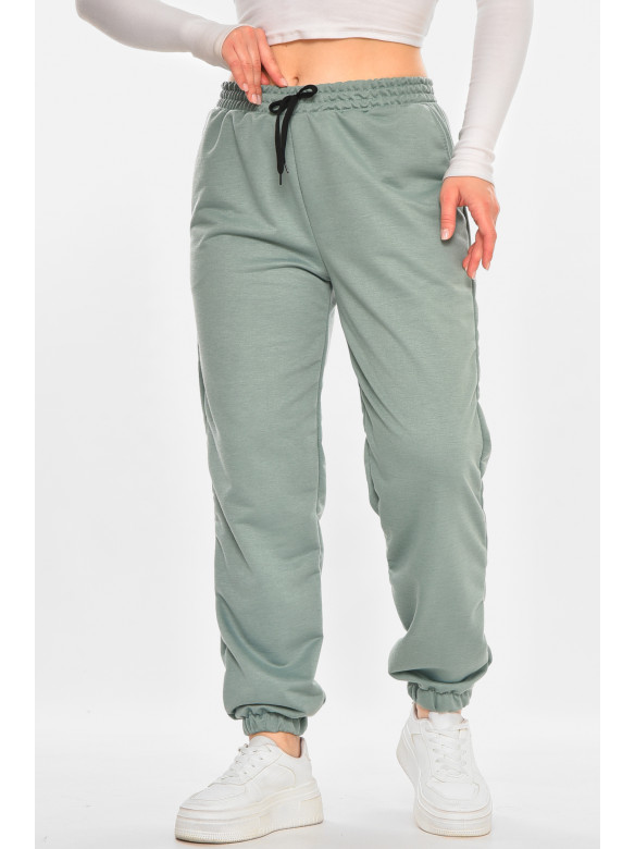 Спортивні штани жіночі напівбатальні однотонні зеленого кольору 212817C