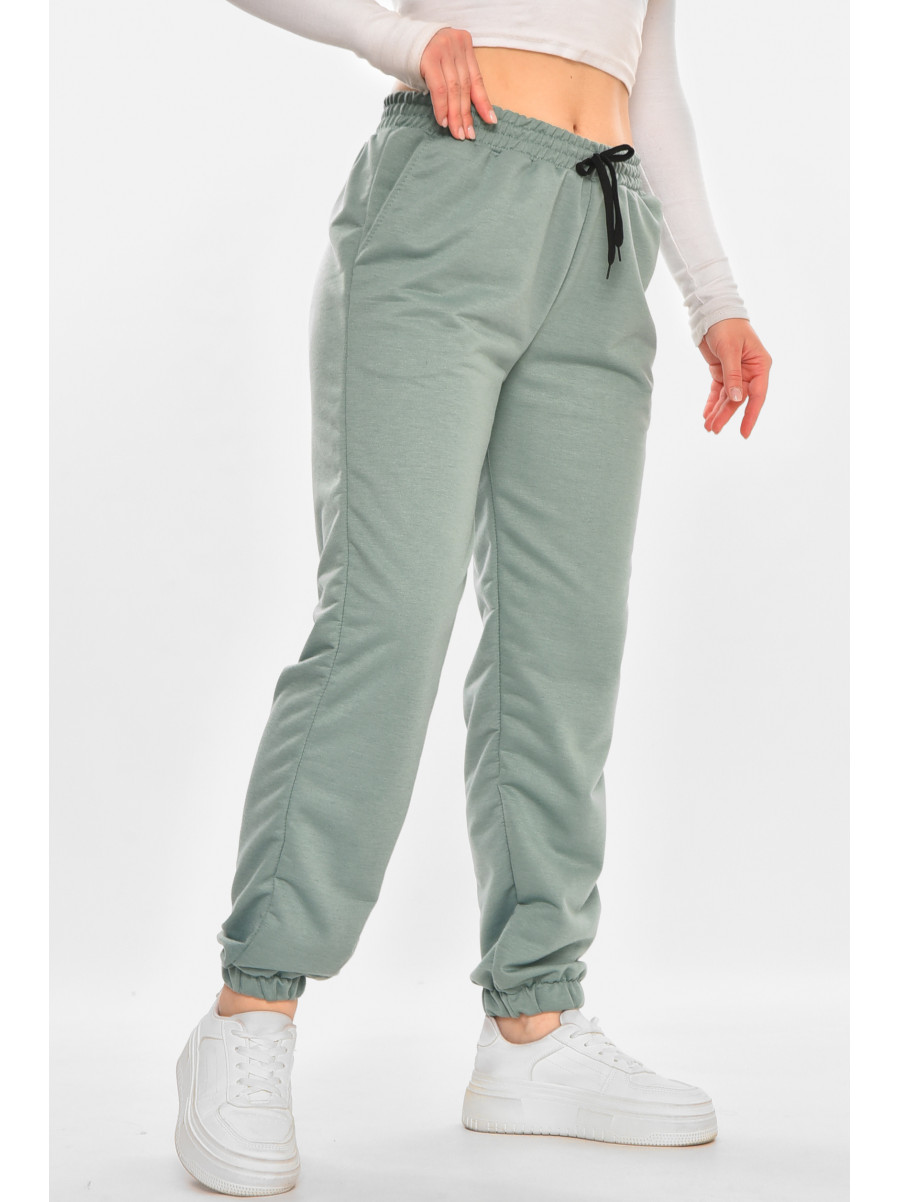 Спортивні штани жіночі напівбатальні однотонні зеленого кольору 212817C