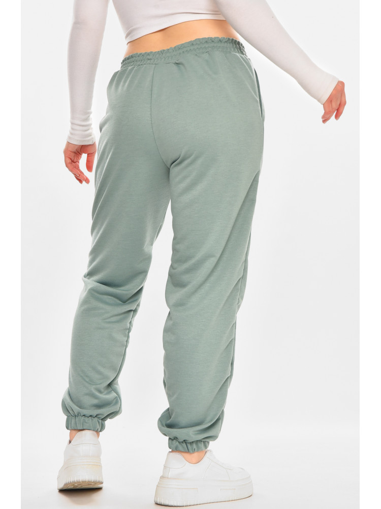 Спортивні штани жіночі напівбатальні однотонні зеленого кольору 212817C