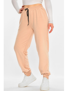 Спортивные штаны женские полубатальные однотонные бежевого цвета 212833C