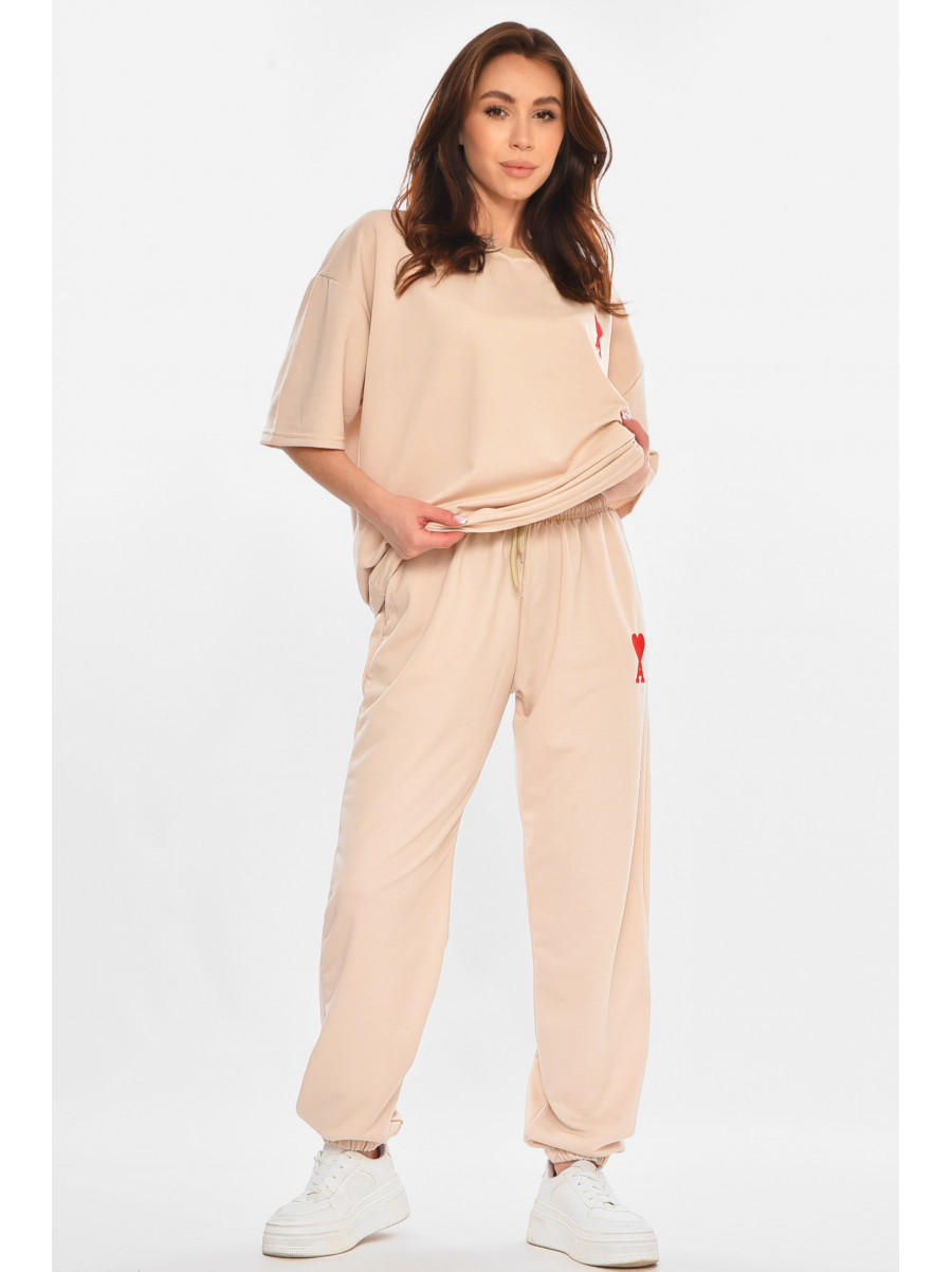 Спортивный костюм женский бежевого цвета 212948C