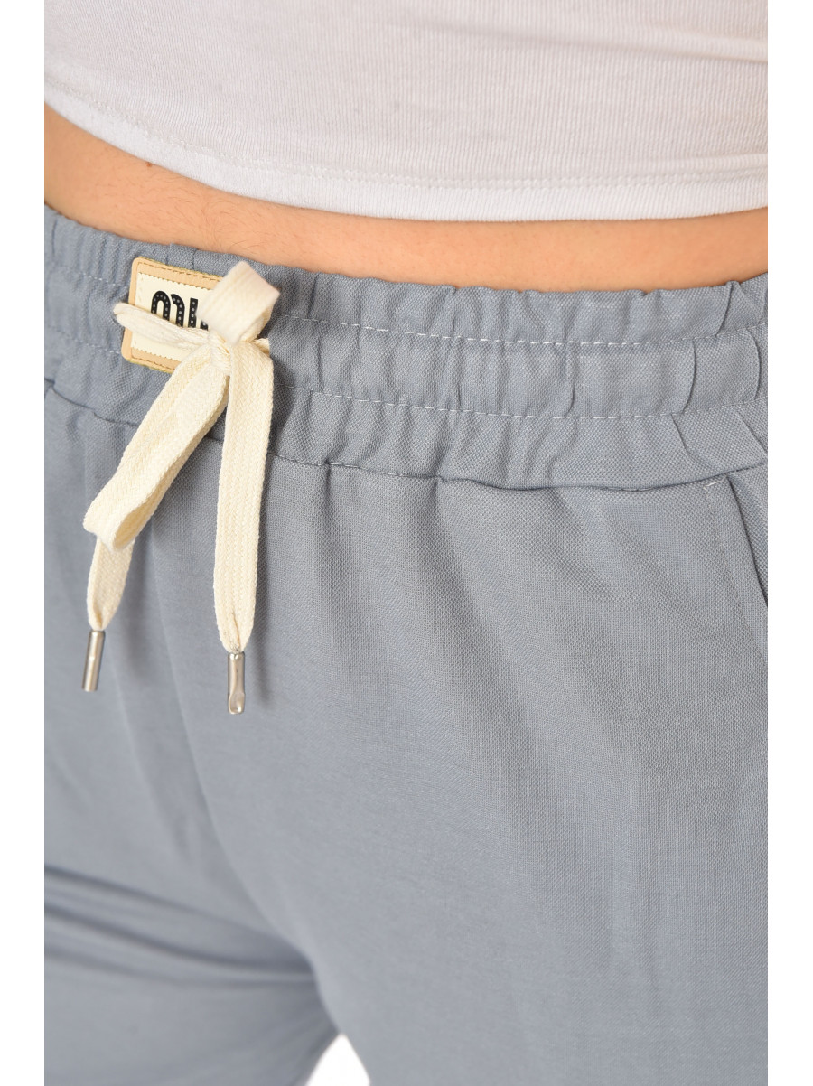 Бриджі жіночі однотонні блакитного кольору 780 213071C